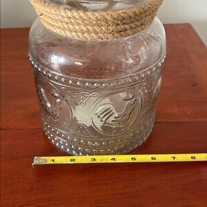 Glass jar candleholder rope around top
Chickens rooster
